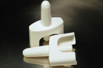 Two nasal spray devices.