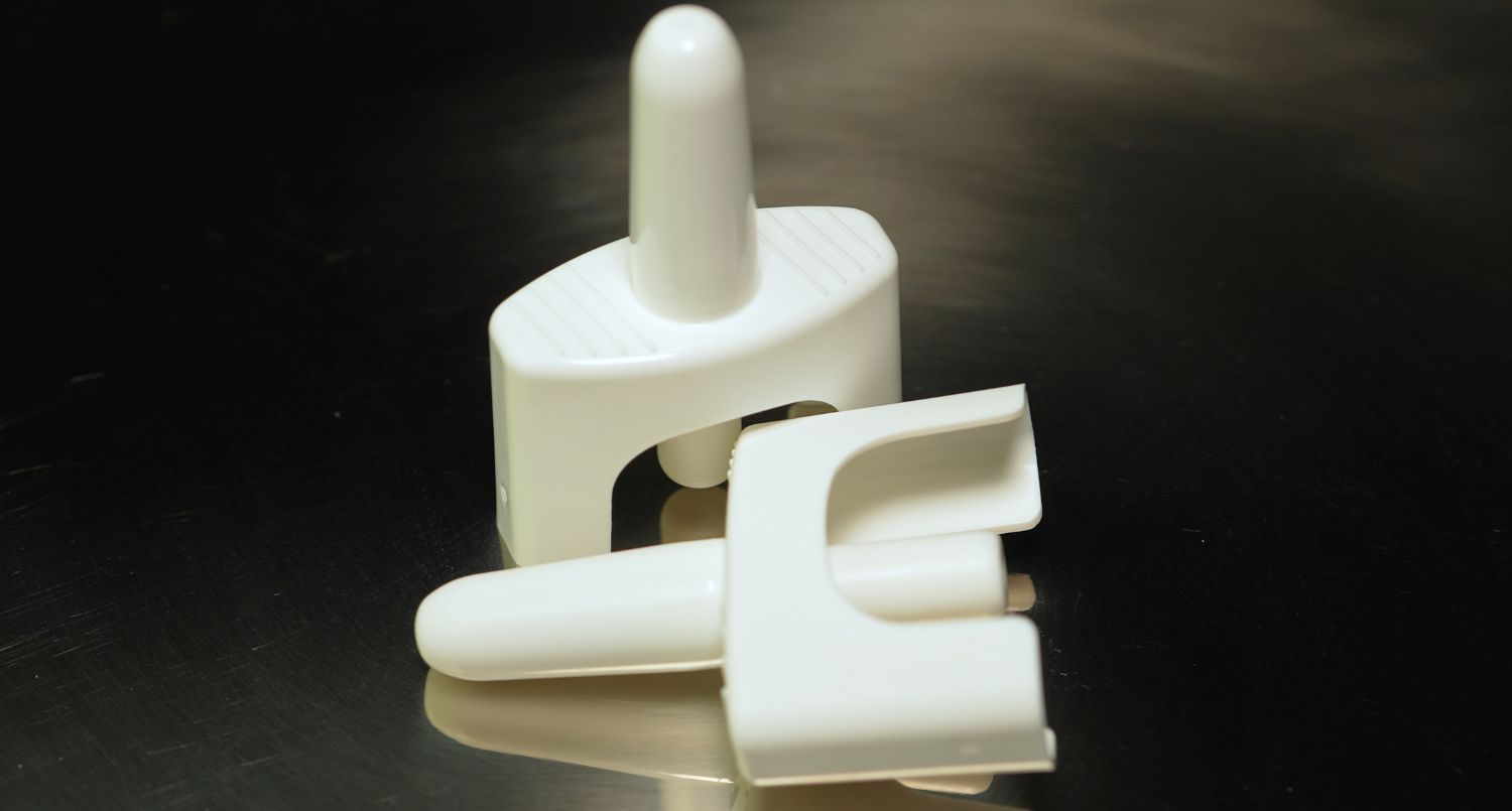 Two nasal spray devices.