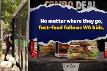 A bus with a fast food advertisement on the back.