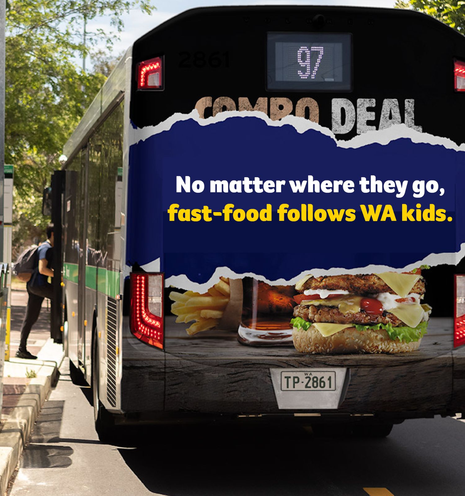 A bus with a fast food advertisement on the back.
